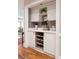 Close up view of the hallway with custom white cabinets and wine rack for storage at , Atlanta, GA 30305