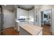Chic kitchen with sleek white cabinetry, stainless steel appliances, and hardwood flooring at , Atlanta, GA 30305