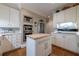 Well-appointed kitchen with stainless appliances, center island, and plenty of cabinet space at , Atlanta, GA 30305