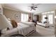 Comfortable main bedroom featuring a seating area and access to a private balcony at , Atlanta, GA 30305