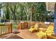 Relax on this wooden back deck and enjoy the surrounding nature and wooded backyard at 1514 Rogers Sw Ave, Atlanta, GA 30310