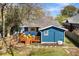 Charming backyard featuring a cozy wooden deck, lush lawn, and a classic privacy fence at 1514 Rogers Sw Ave, Atlanta, GA 30310