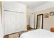 Tasteful bedroom offers hardwood floors, neutral walls, built-in closet and natural light at 1514 Rogers Sw Ave, Atlanta, GA 30310
