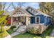 Quaint craftsman home with blue brick, stone accents, and a cozy front porch at 1514 Rogers Sw Ave, Atlanta, GA 30310