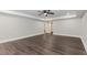 Open finished basement with tile flooring, neutral paint, and recessed lighting at 247 Old Timber Rd, Lawrenceville, GA 30046
