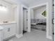 Modern bathroom showcasing a shower, vanity, and soaking tub, creating a spa-like retreat at 247 Old Timber Rd, Lawrenceville, GA 30046