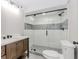 Elegant bathroom featuring a glass shower with subway tile and pebble accents at 247 Old Timber Rd, Lawrenceville, GA 30046