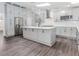 Bright kitchen featuring a large island, stainless steel appliances and lots of cabinet space at 247 Old Timber Rd, Lawrenceville, GA 30046