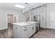 Bright spacious kitchen with large island, stainless dishwasher and updated cabinets at 247 Old Timber Rd, Lawrenceville, GA 30046