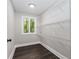 Walk-in closet with shelves, overhead lighting, and modern flooring at 247 Old Timber Rd, Lawrenceville, GA 30046