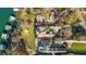 Aerial view of luxury property featuring a pool, manicured grounds, and private access to waterfront at 6316 Woodlake Dr, Buford, GA 30518