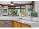 Well-appointed kitchen with granite countertops, stainless steel appliances, and natural lighting at 6316 Woodlake Dr, Buford, GA 30518