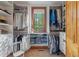 Walk-in closet with ample storage and a window at 6316 Woodlake Dr, Buford, GA 30518