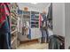 Walk-in closet with shelving and hanging racks, and shoe storage at 6316 Woodlake Dr, Buford, GA 30518