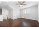 Bright and spacious bedroom with hardwood floors and a large window at 319 Riverton Way, Woodstock, GA 30188
