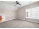 Bedroom features neutral paint, carpet, window with blinds, ceiling fan and crawl space at 319 Riverton Way, Woodstock, GA 30188
