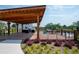 Community deck overlooks pool and offers scenic views, perfect for relaxation and entertainment at 319 Riverton Way, Woodstock, GA 30188