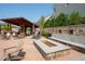 Community fire pit and outdoor seating area, perfect for relaxing with friends and Gathering on cool evenings at 319 Riverton Way, Woodstock, GA 30188