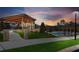 View of the community pool, pavilion, and surrounding green spaces, perfect for outdoor entertaining at 319 Riverton Way, Woodstock, GA 30188