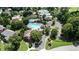 Community aerial view showcasing the pool, tennis courts, and well-manicured grounds at 4710 Mcintosh Dr, Cumming, GA 30040