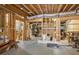 Spacious unfinished basement with exposed ceiling and walls, providing ample storage or renovation possibilities at 4710 Mcintosh Dr, Cumming, GA 30040