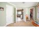 A view of the open doors to the ensuite bathroom and walk-in closet in the main bedroom at 4710 Mcintosh Dr, Cumming, GA 30040