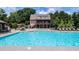 Resort-style community pool and spa with a spacious deck and ample seating near the clubhouse at 4710 Mcintosh Dr, Cumming, GA 30040