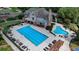 An aerial view showcases the community pool, gathering spaces, and well-maintained landscape at 2510 Bent Creek Way, Cumming, GA 30041