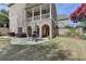 Spacious backyard features a patio and a lush lawn at 2510 Bent Creek Way, Cumming, GA 30041
