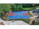 A fenced basketball court and play area is the center of attention in this backyard at 2510 Bent Creek Way, Cumming, GA 30041