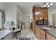 Elegant bathroom with granite countertops, custom cabinetry, and a separate bathtub at 2510 Bent Creek Way, Cumming, GA 30041