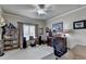 Relaxing bedroom with ample storage, natural light and fan for added comfort at 2510 Bent Creek Way, Cumming, GA 30041