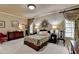 Charming bedroom featuring floral accents, soft natural light and decorative furnishings at 2510 Bent Creek Way, Cumming, GA 30041
