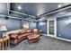Home theater featuring surround sound, a projector and a spacious seating area at 2510 Bent Creek Way, Cumming, GA 30041