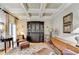 Inviting living room with coffered ceiling, hardwood floors, and ample seating at 2510 Bent Creek Way, Cumming, GA 30041