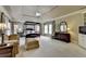 Bright main bedroom with a four-poster bed, sitting area, and tray ceiling with crown molding at 2510 Bent Creek Way, Cumming, GA 30041