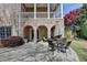 Charming brick patio with outdoor seating, perfect for entertaining guests at 2510 Bent Creek Way, Cumming, GA 30041