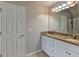 Updated bathroom featuring double sinks and granite countertops at 3285 Watson Gate Rd, Loganville, GA 30052