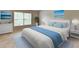 Tranquil bedroom featuring large windows, a dresser, and soft, calming colors at 3285 Watson Gate Rd, Loganville, GA 30052