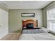 Comfortable bedroom featuring carpet, a large window, and a white closet door at 3285 Watson Gate Rd, Loganville, GA 30052
