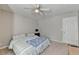 Light and airy bedroom with neutral walls, carpet, and a large window at 3285 Watson Gate Rd, Loganville, GA 30052