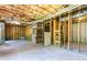 Unfinished basement with exposed wood framing and insulation, offering potential for customization at 55 Maple Leaf Ct, Dallas, GA 30157