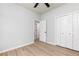 Bedroom with hardwood floors and closet with double doors at 55 Maple Leaf Ct, Dallas, GA 30157
