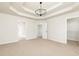 Bright bedroom with neutral walls, carpet, and multiple entry points at 55 Maple Leaf Ct, Dallas, GA 30157
