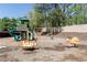 Community playground area with various play structures for enjoyment at 55 Maple Leaf Ct, Dallas, GA 30157