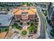 Aerial view of government building with manicured gardens, parking and green space at 5808 Deer Crossing Dr, Sugar Hill, GA 30518