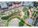 Aerial view of community amphitheater with water features, seating and green spaces at 5808 Deer Crossing Dr, Sugar Hill, GA 30518