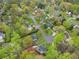 An aerial view shows the proximity to community pool, mature trees and the neighborhood at 2051 Candlewood Ne Ct, Marietta, GA 30066
