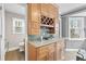 Wet bar with wine rack, storage, and convenient access to the breakfast nook at 2051 Candlewood Ne Ct, Marietta, GA 30066
