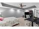 Modern bedroom with a geometric ceiling, a ceiling fan, and a cozy bed at 2051 Candlewood Ne Ct, Marietta, GA 30066